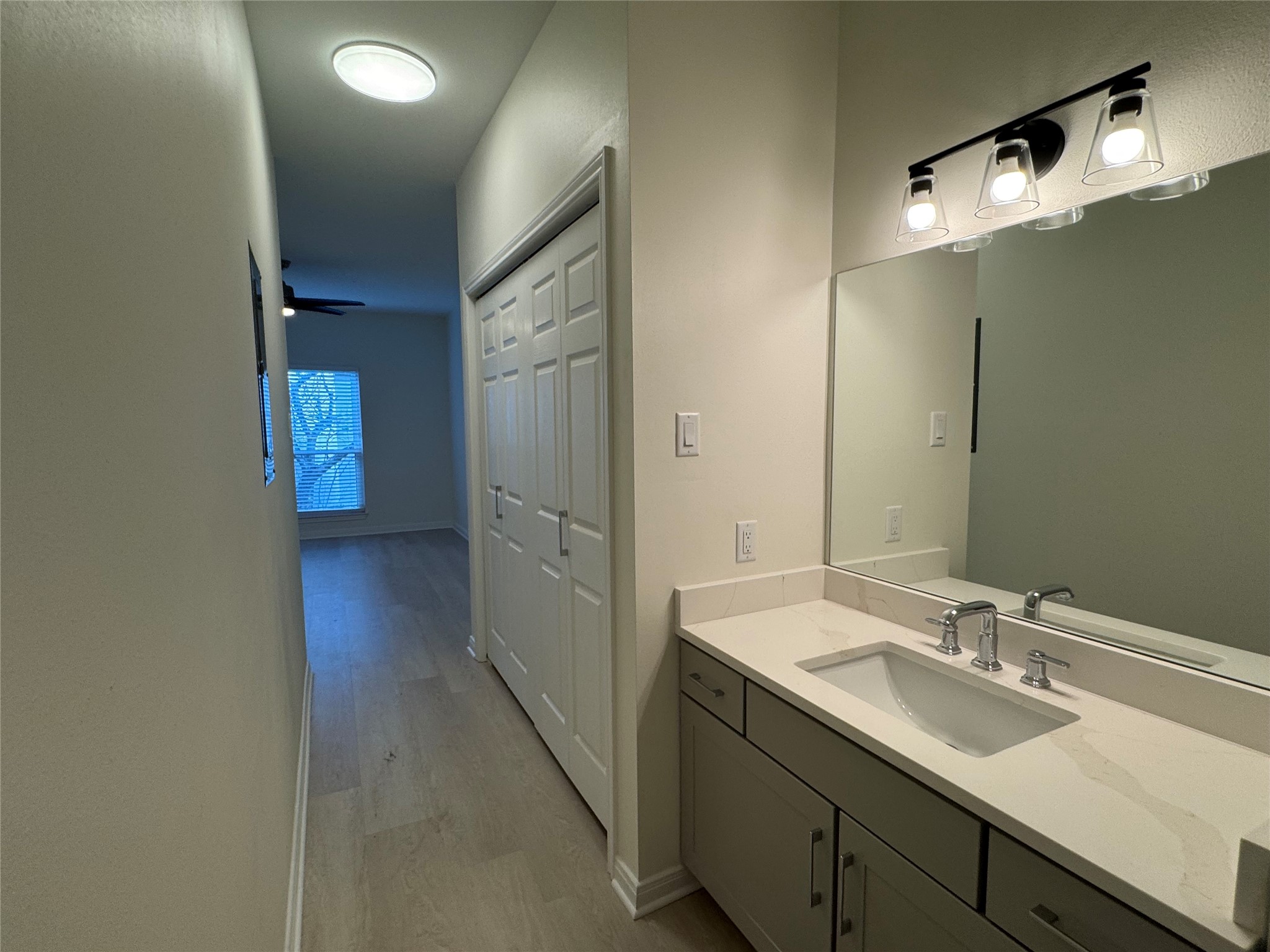 2100 Tanglewilde Street, Unit 626 Houston, TX 77063 - Photo 9 of 36 Primary bathroom vanity and view of closet 2