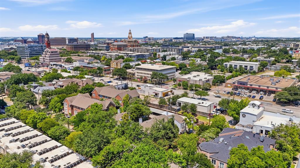 2815 Welborn Street, Unit 101 Dallas, TX 75219 - Photo 27 of 29 Expansive aerial perspective showcasing a vibrant urban landscape with diverse architectural styles