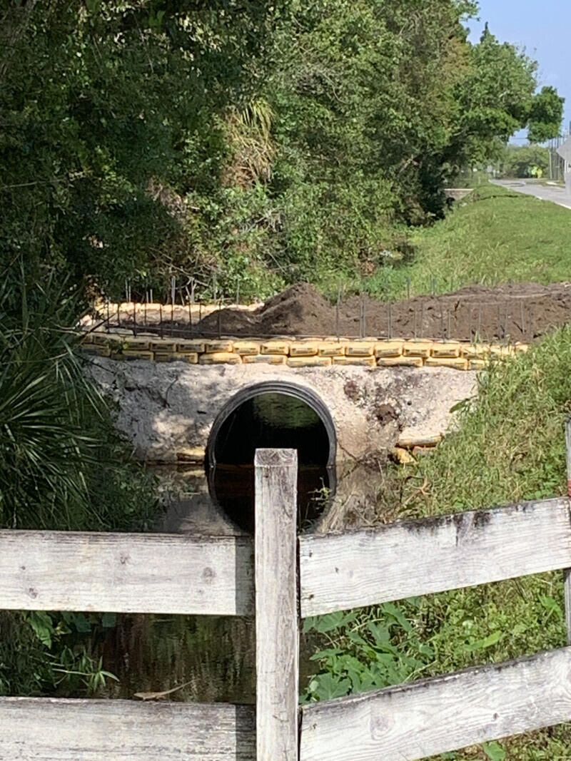 1301 North Range Road Cocoa, FL 32926 - Photo 4 of 6 a front view of a house with garden
