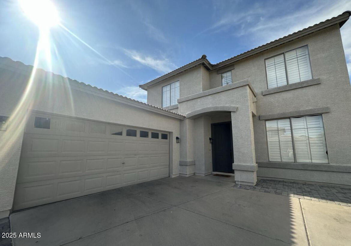 90 West Beechnut Place Chandler, AZ 85248 - Photo 1 of 32 a view of a house with a garage