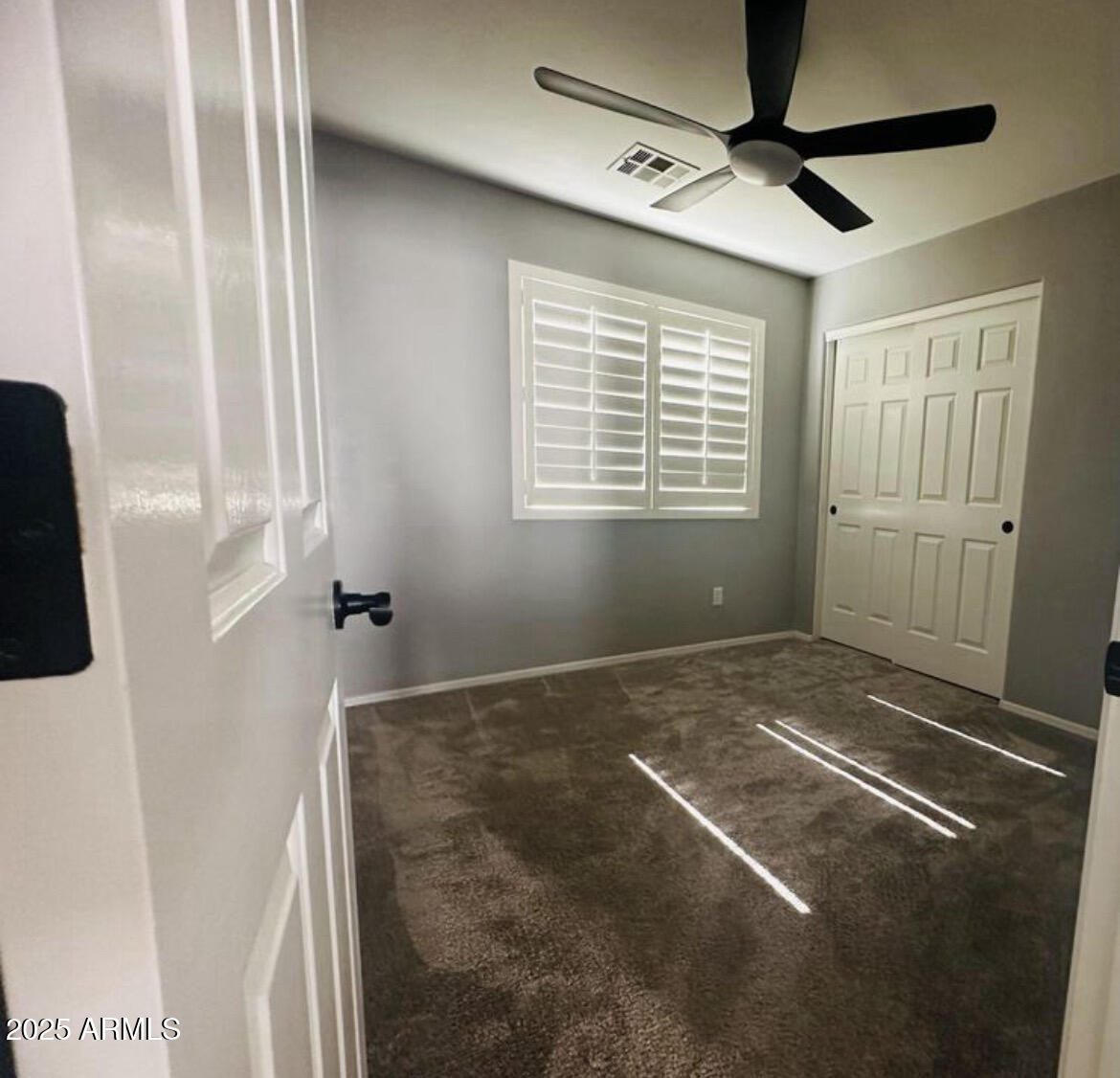 90 West Beechnut Place Chandler, AZ 85248 - Photo 19 of 32 a view of an empty room with a window