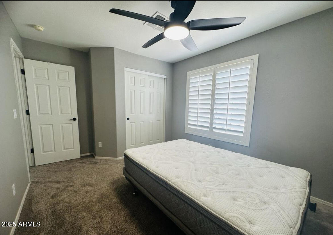 90 West Beechnut Place Chandler, AZ 85248 - Photo 20 of 32 a bedroom with a bed and a window
