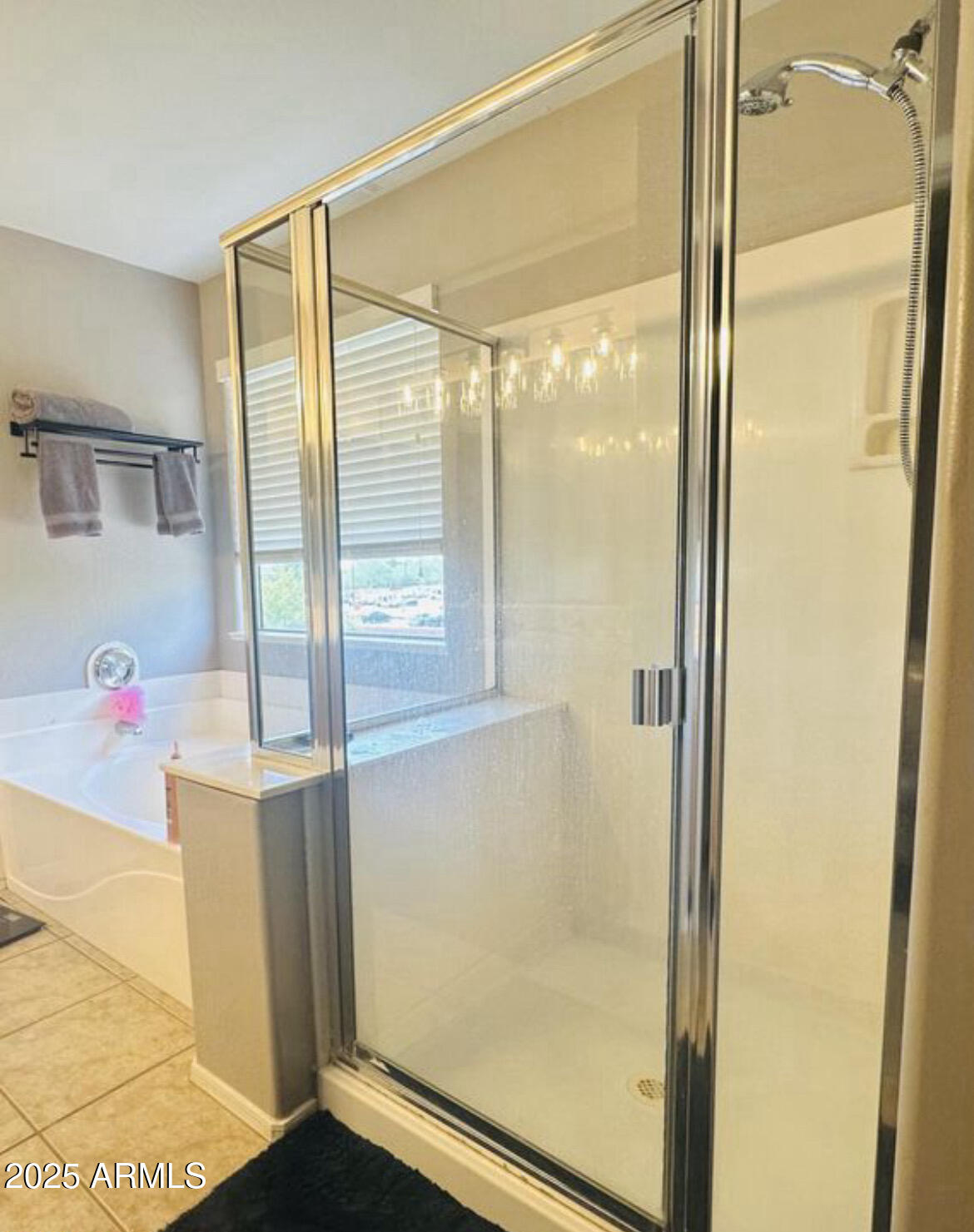 90 West Beechnut Place Chandler, AZ 85248 - Photo 22 of 32 a bathroom with a bathtub and a shower