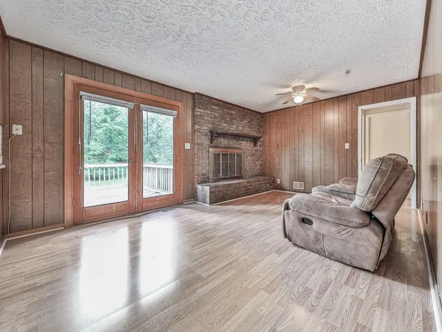 a view of livingroom with furniture and front door