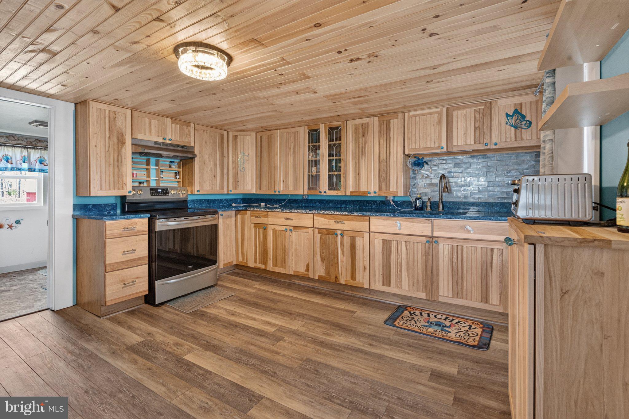 1511 Crocheron Road Crocheron, MD 21627 - Photo 19 of 76 Warm wood tones meet coastal charm.