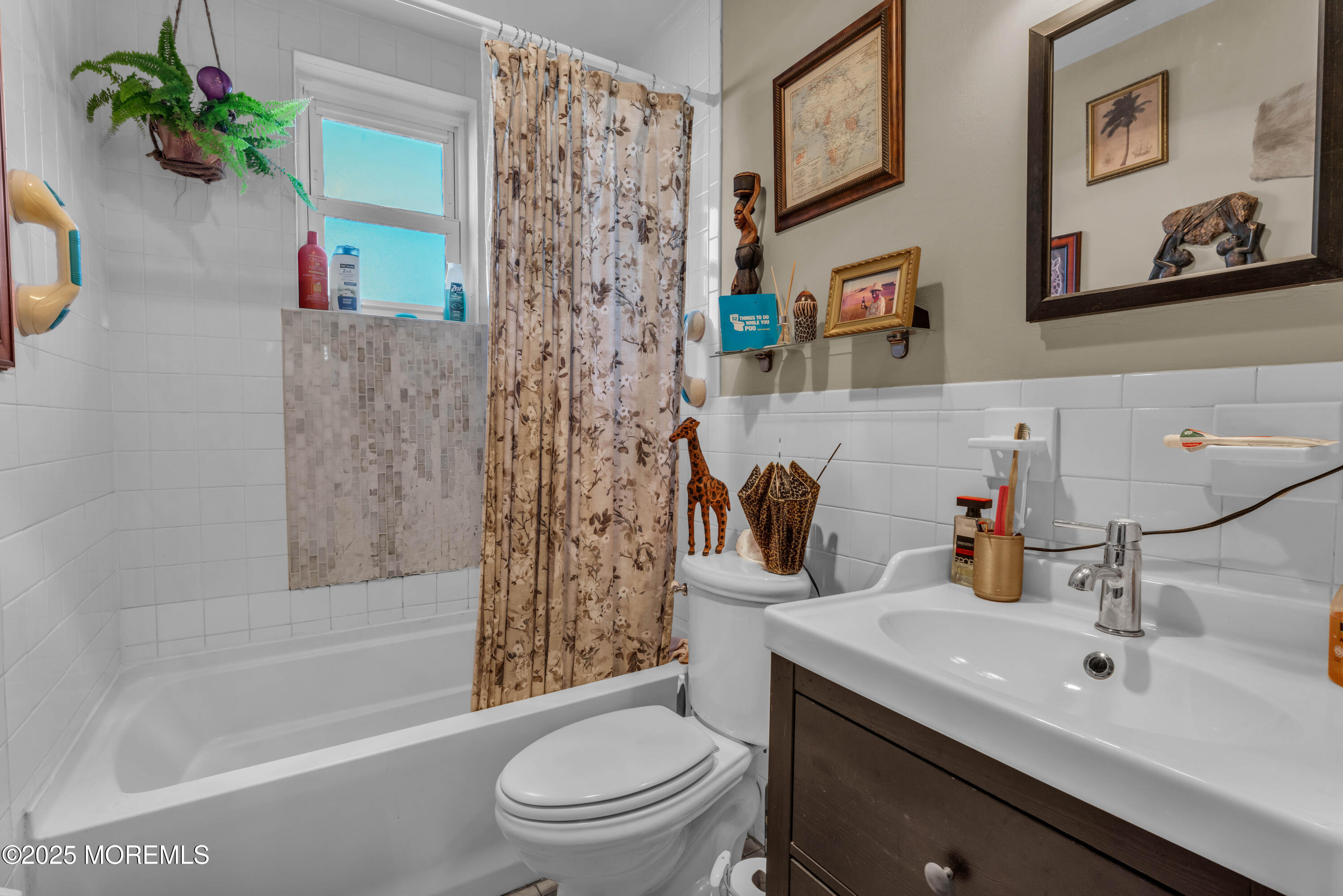 1217 Union Avenue Union Beach, NJ 07735 - Photo 2 of 26 a bathroom with a sink a toilet and shower