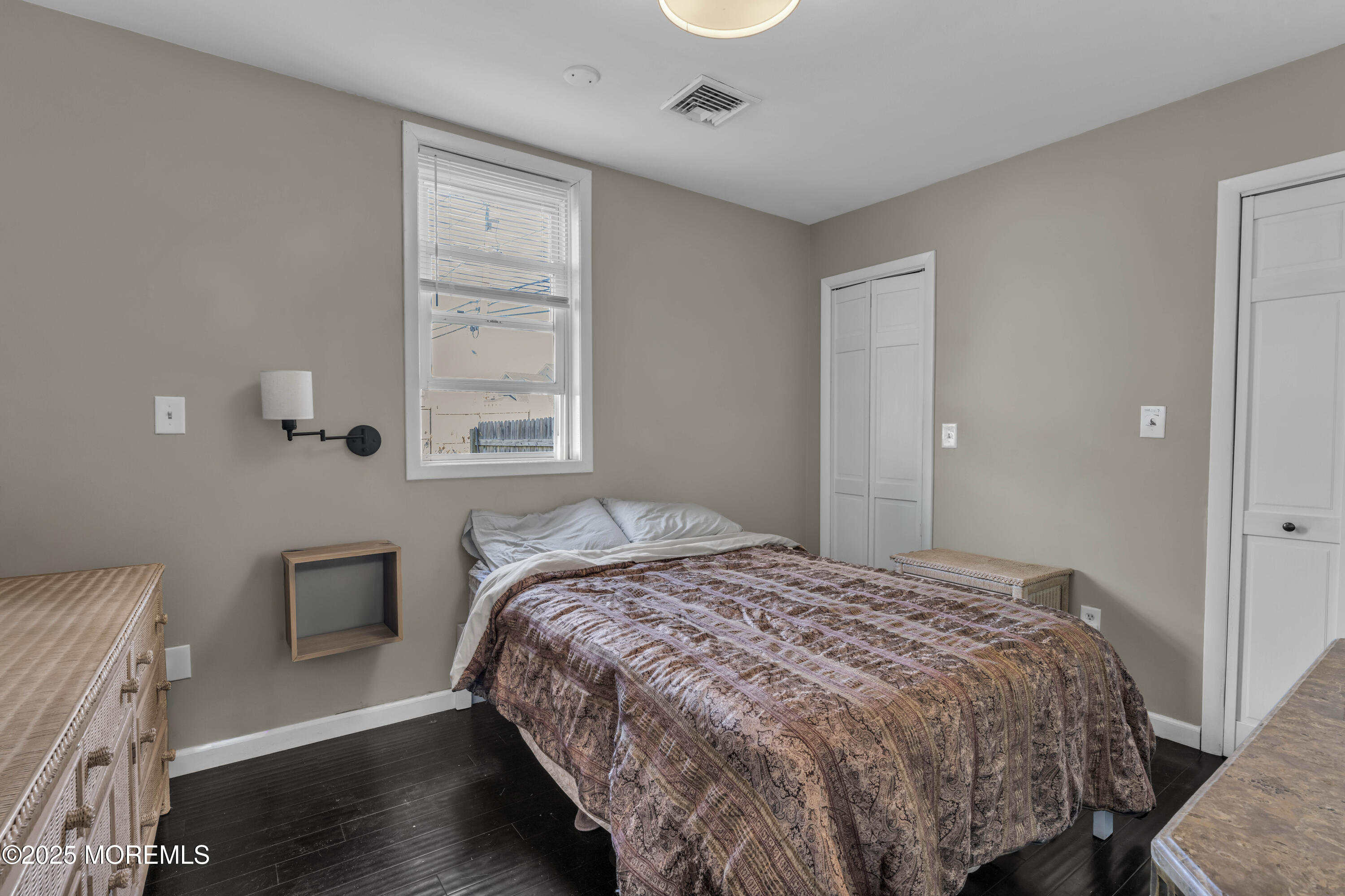 1217 Union Avenue Union Beach, NJ 07735 - Photo 24 of 26 a bedroom with a bed and a window