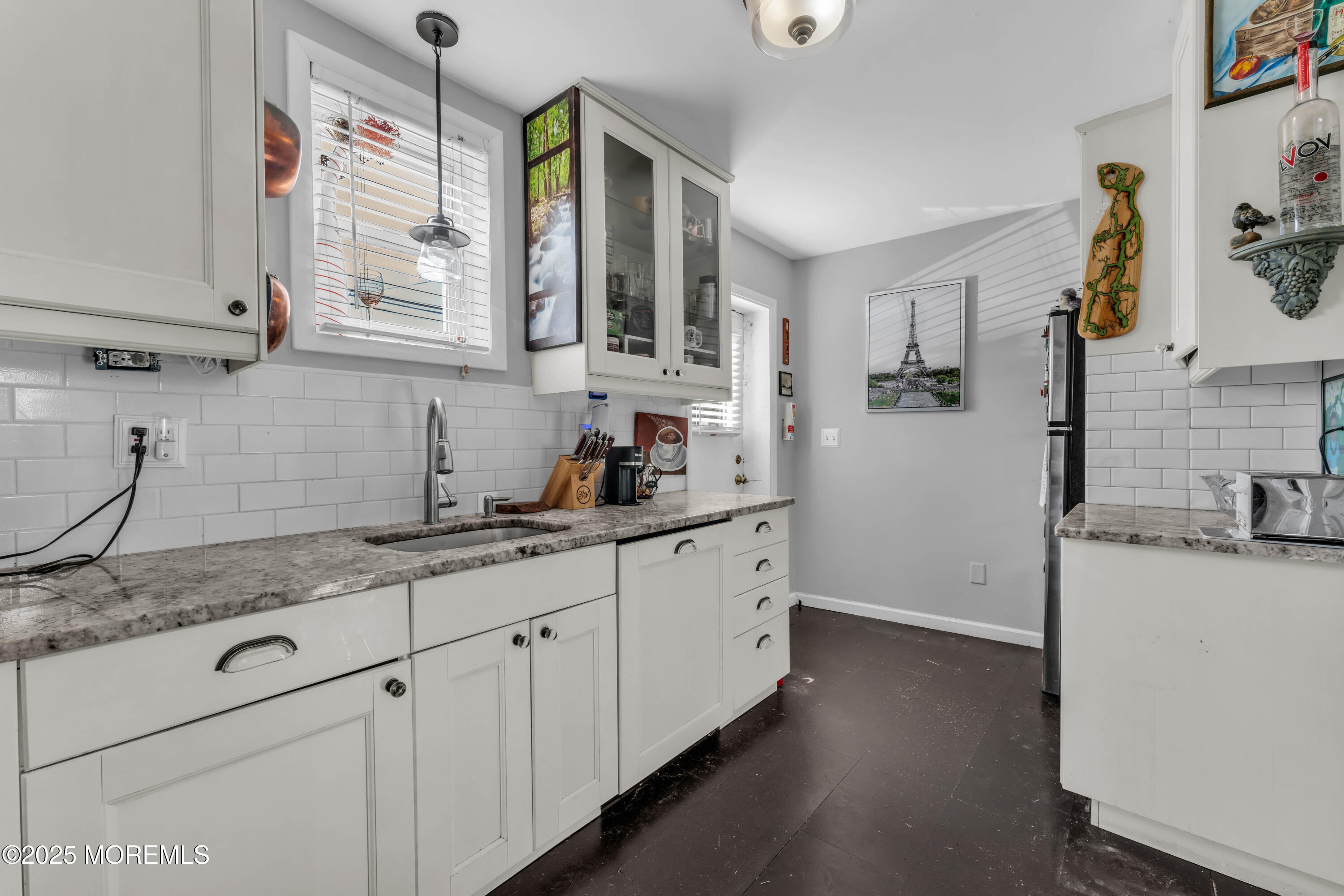 1217 Union Avenue Union Beach, NJ 07735 - Photo 9 of 26 a kitchen with sink cabinets and window