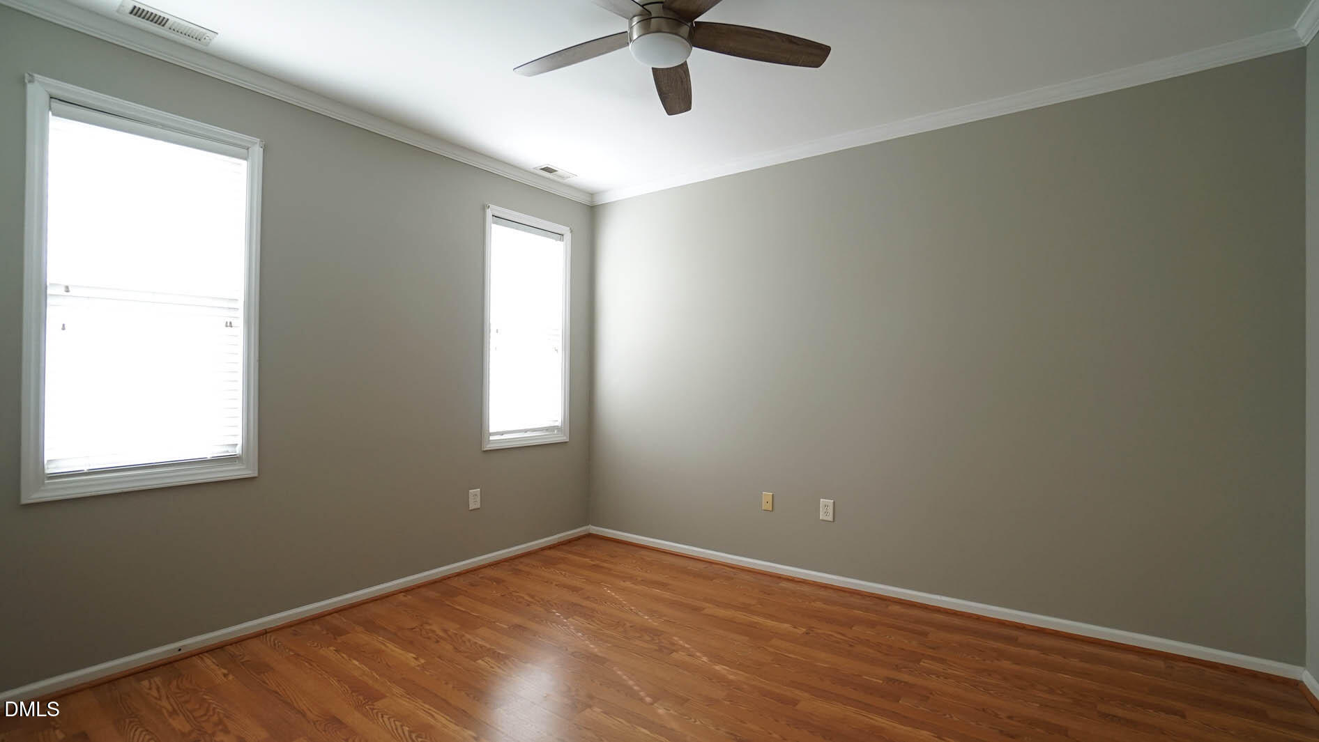 41 Signet Drive Durham, NC 27705 - Photo 18 of 34 an empty room with a window and a fan