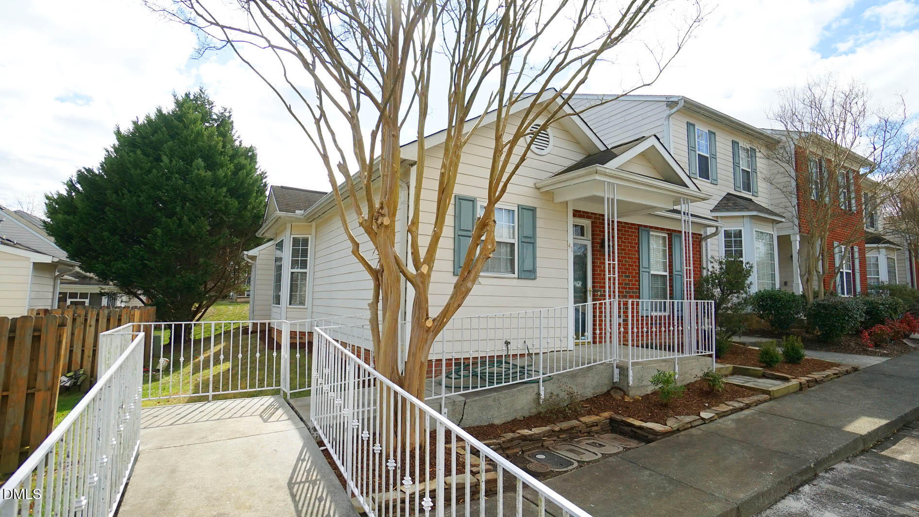 41 Signet Drive Durham, NC 27705 - Photo 2 of 34 a front view of a house with cars parked