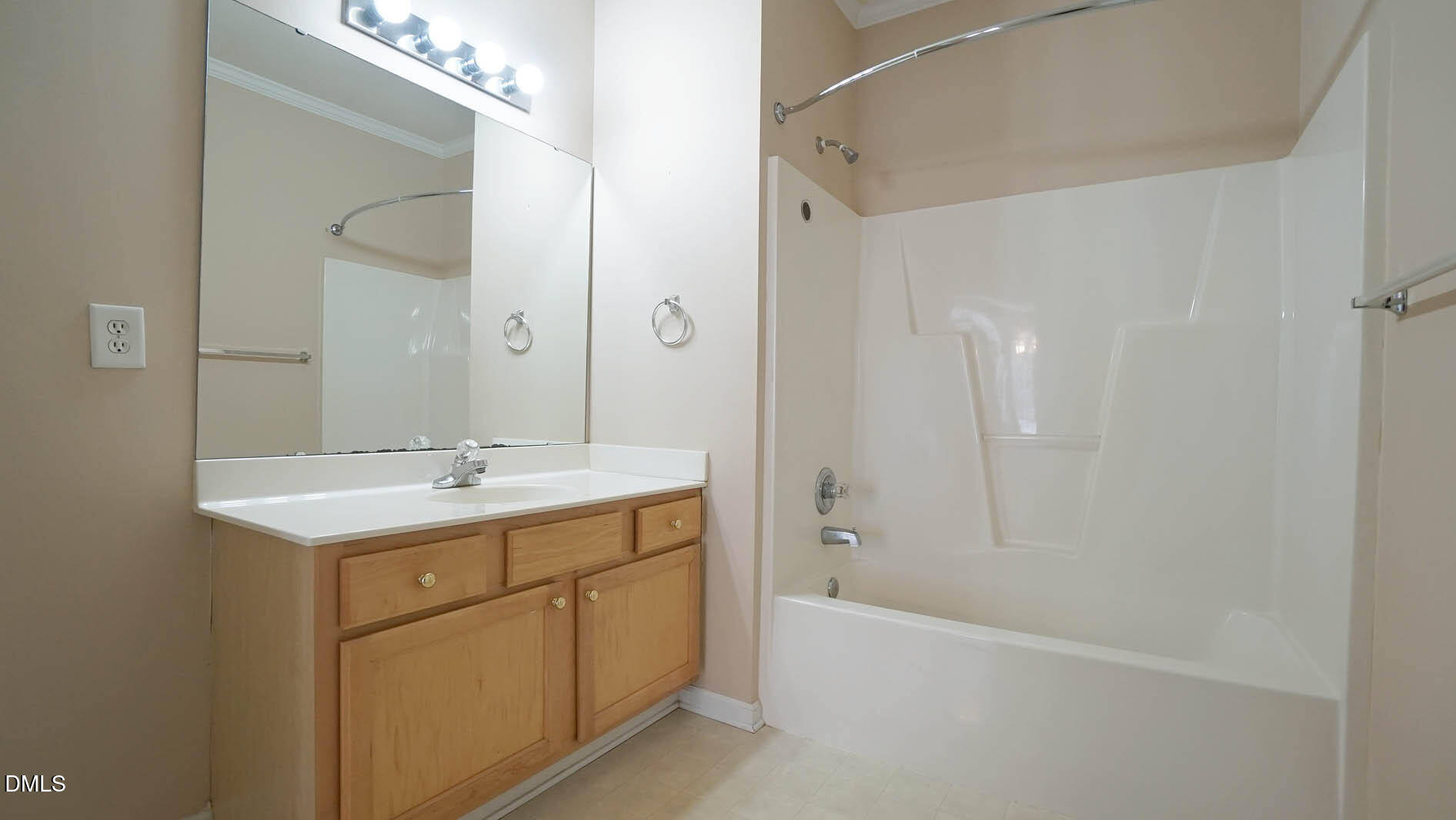 41 Signet Drive Durham, NC 27705 - Photo 23 of 34 a bathroom with a double vanity sink and mirror