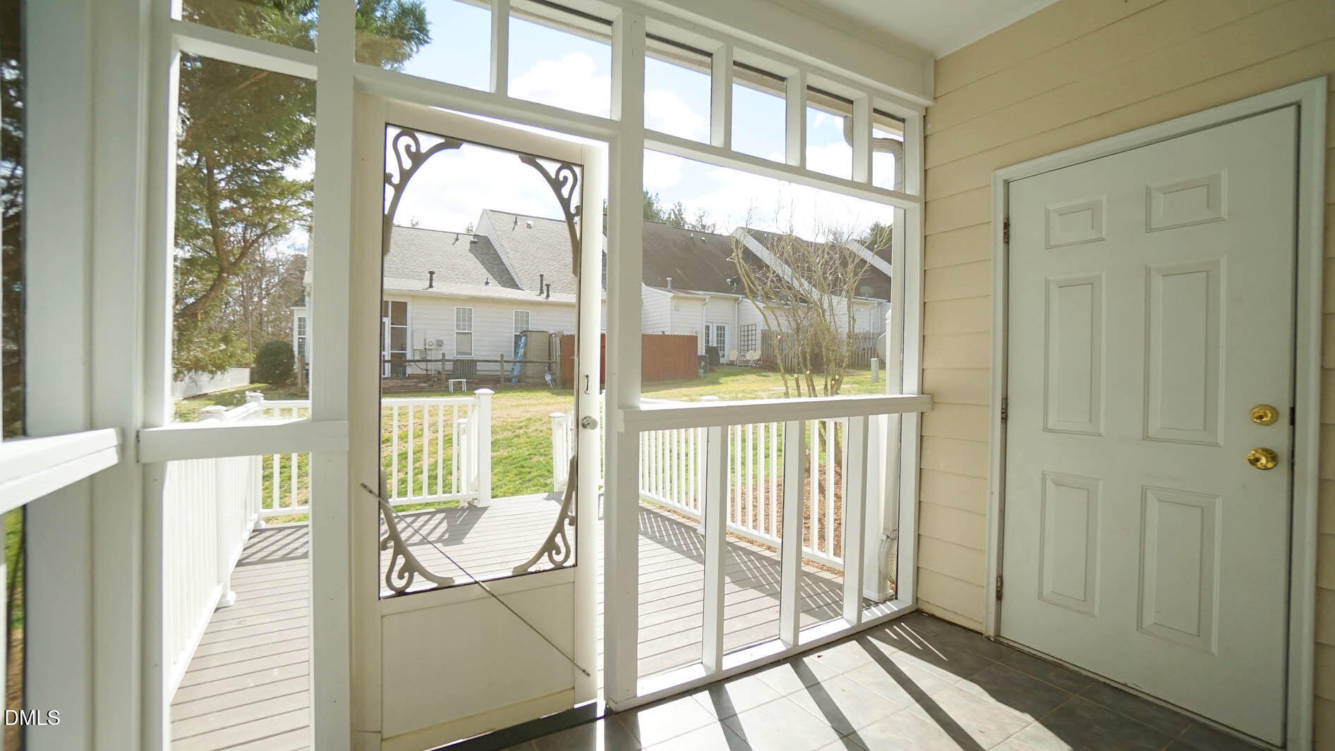 41 Signet Drive Durham, NC 27705 - Photo 29 of 34 a view of a balcony with wooden floor and door
