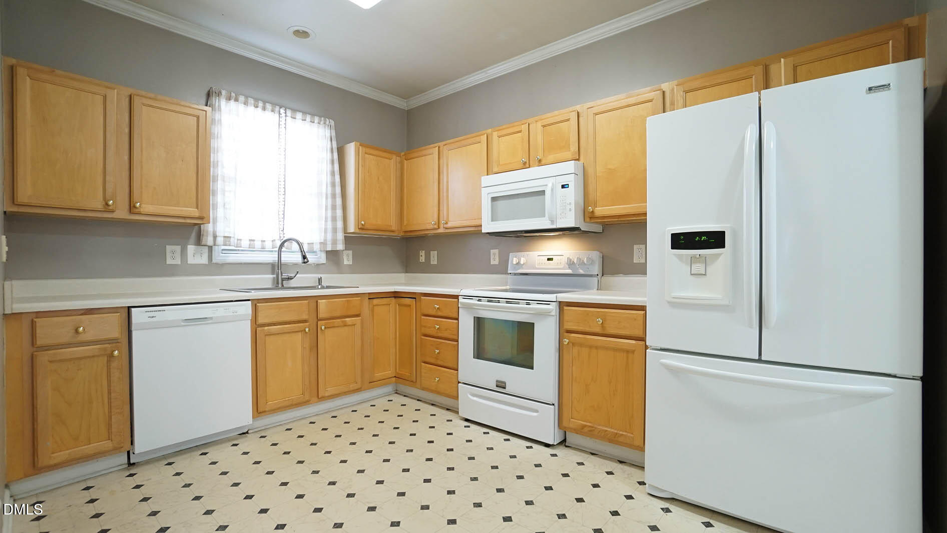 41 Signet Drive Durham, NC 27705 - Photo 8 of 34 a kitchen with stainless steel appliances a refrigerator sink and microwave