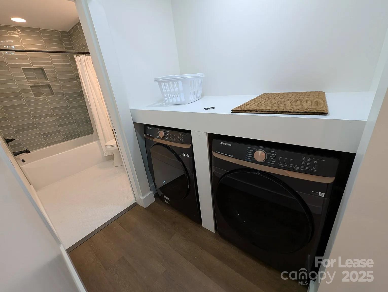 24 Woodrow Avenue Asheville, NC 28801 - Photo 21 of 30 a utility room with dryer and washer