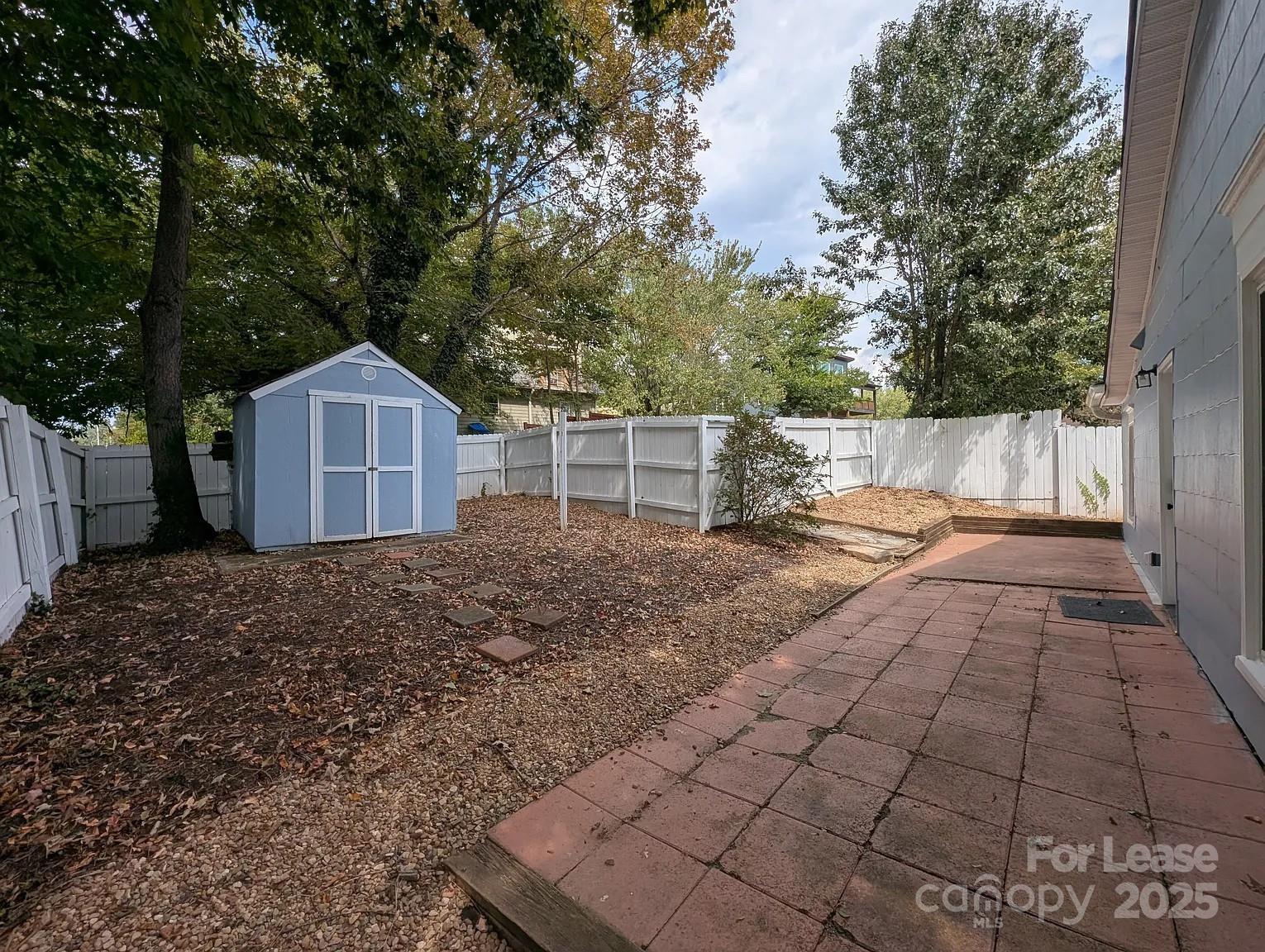 24 Woodrow Avenue Asheville, NC 28801 - Photo 25 of 30 a view of a backyard of the house
