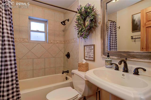 5790 Ona Road Cascade, CO 80809 - Photo 14 of 32 Main floor bathroom