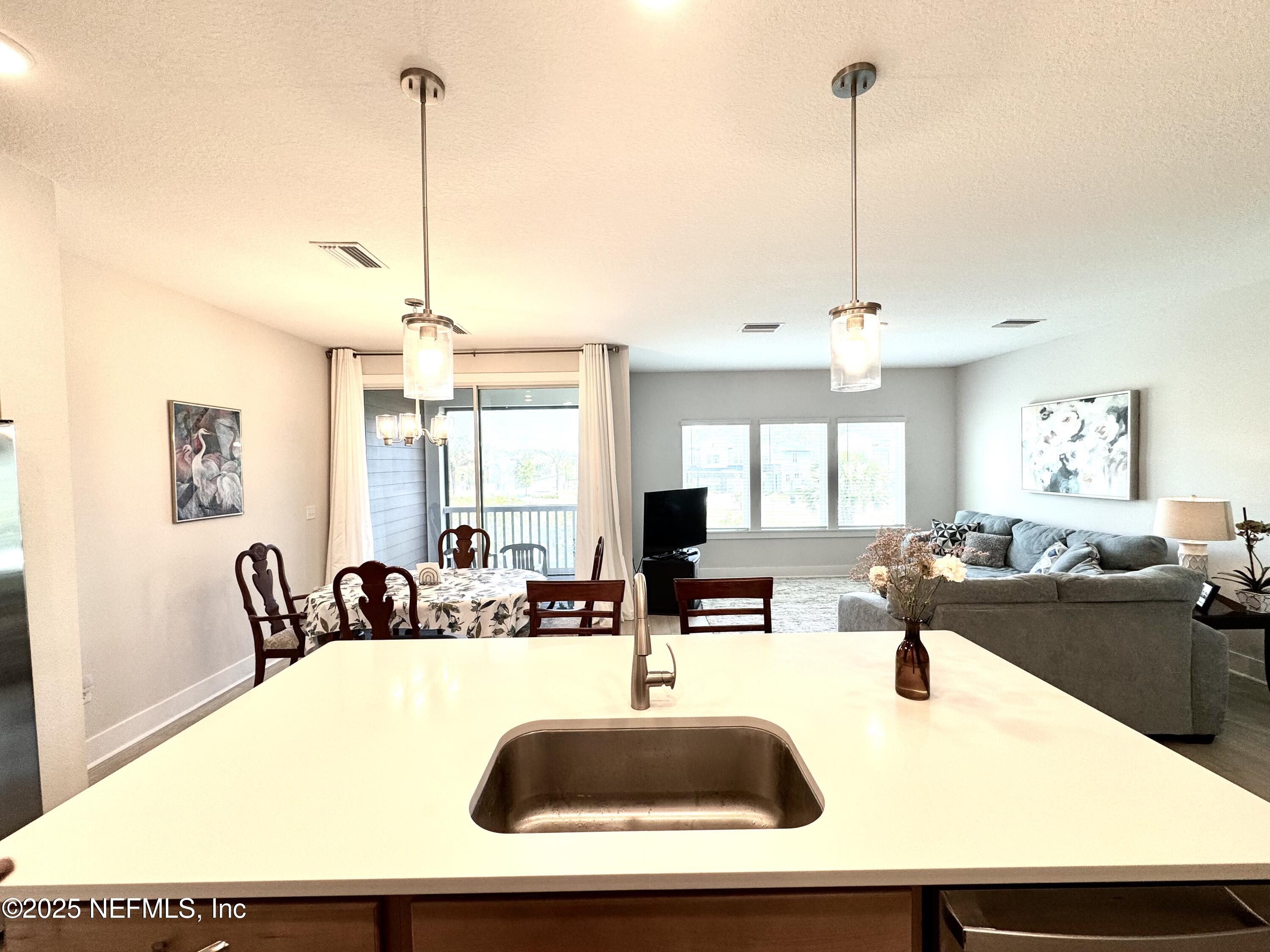 9860 Element Road Jacksonville, FL 32256 - Photo 11 of 35 Kitchen/Living Area