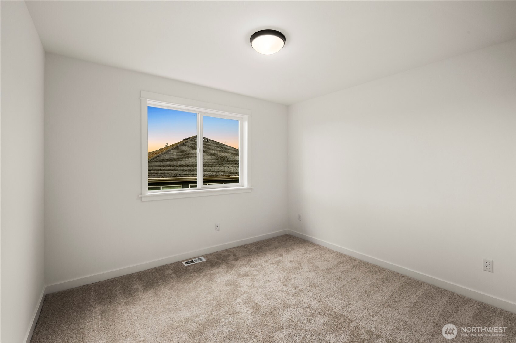 4128 220th Street Southeast Bothell, WA 98021 - Photo 25 of 31 an empty room with a window