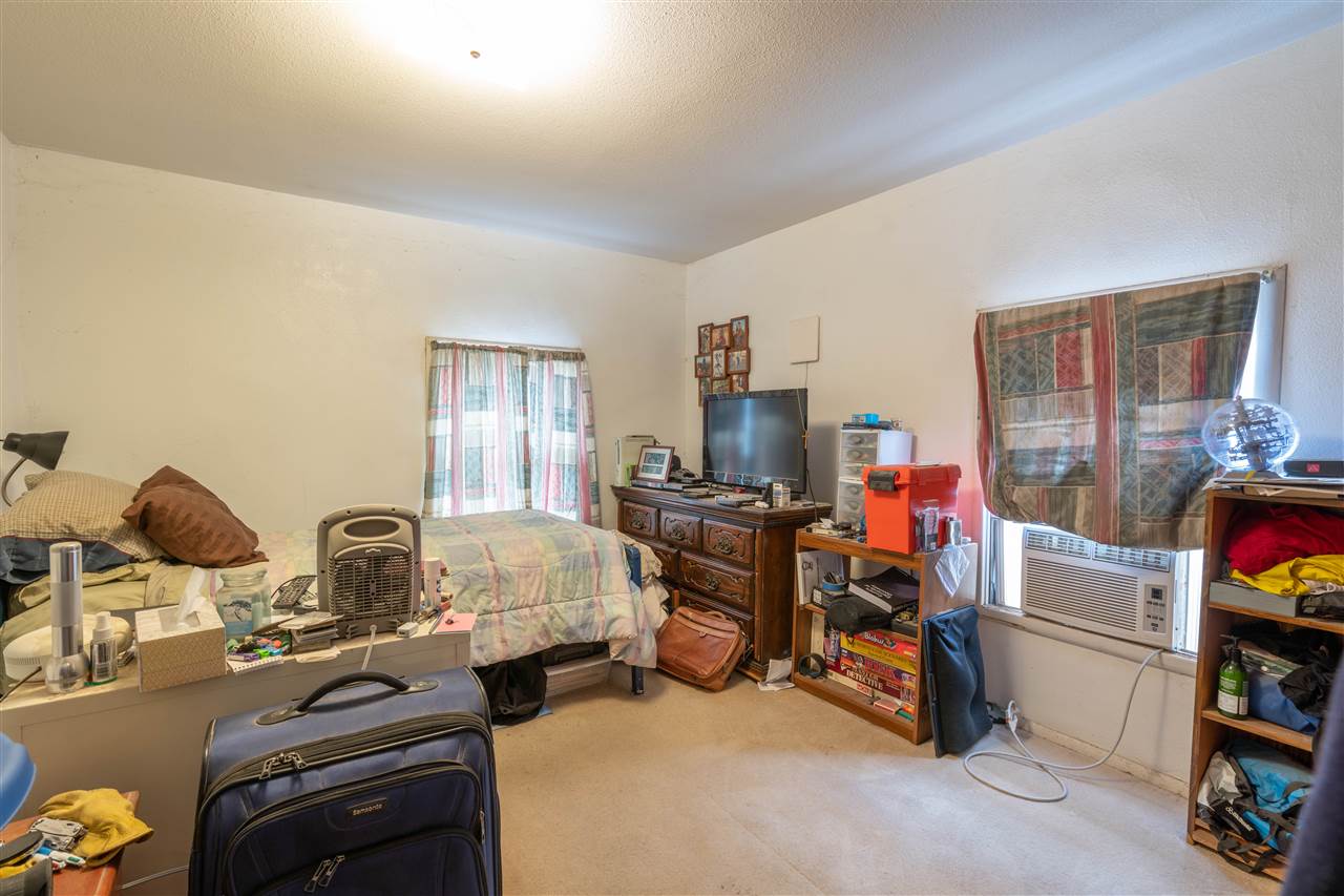 824 22 Road Grand Junction, CO 81505 - Photo 8 of 21 a bedroom with furniture and a window