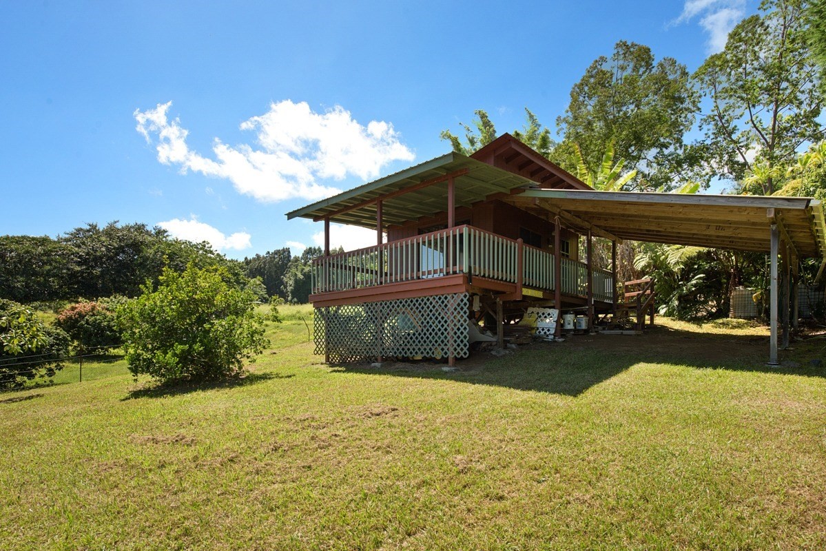 35-1625 Uweki Road Papaaloa, HI 96780 - Photo 11 of 20 a view of a house with a yard