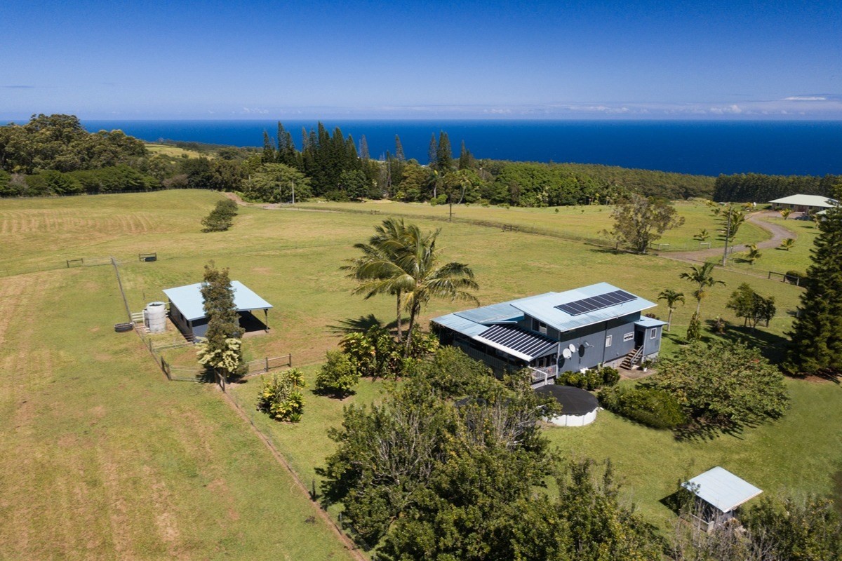 35-1625 Uweki Road Papaaloa, HI 96780 - Photo 18 of 20 an aerial view of a house with a lake view