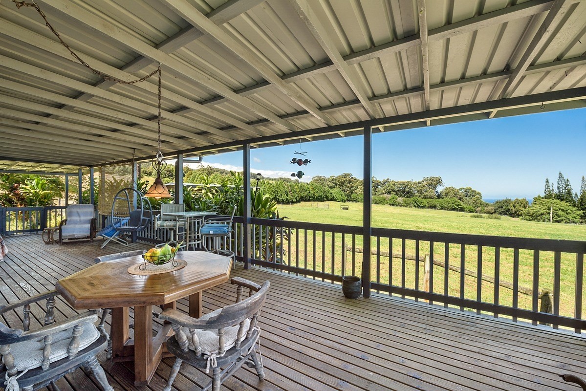 35-1625 Uweki Road Papaaloa, HI 96780 - Photo 7 of 20 a view of a patio with a table chairs and a patio