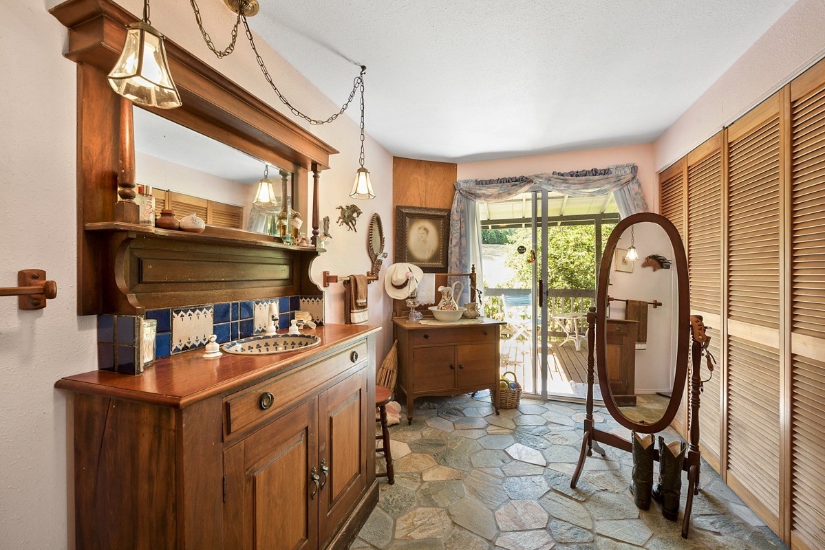 35-1625 Uweki Road Papaaloa, HI 96780 - Photo 8 of 20 a view of a kitchen with a large window