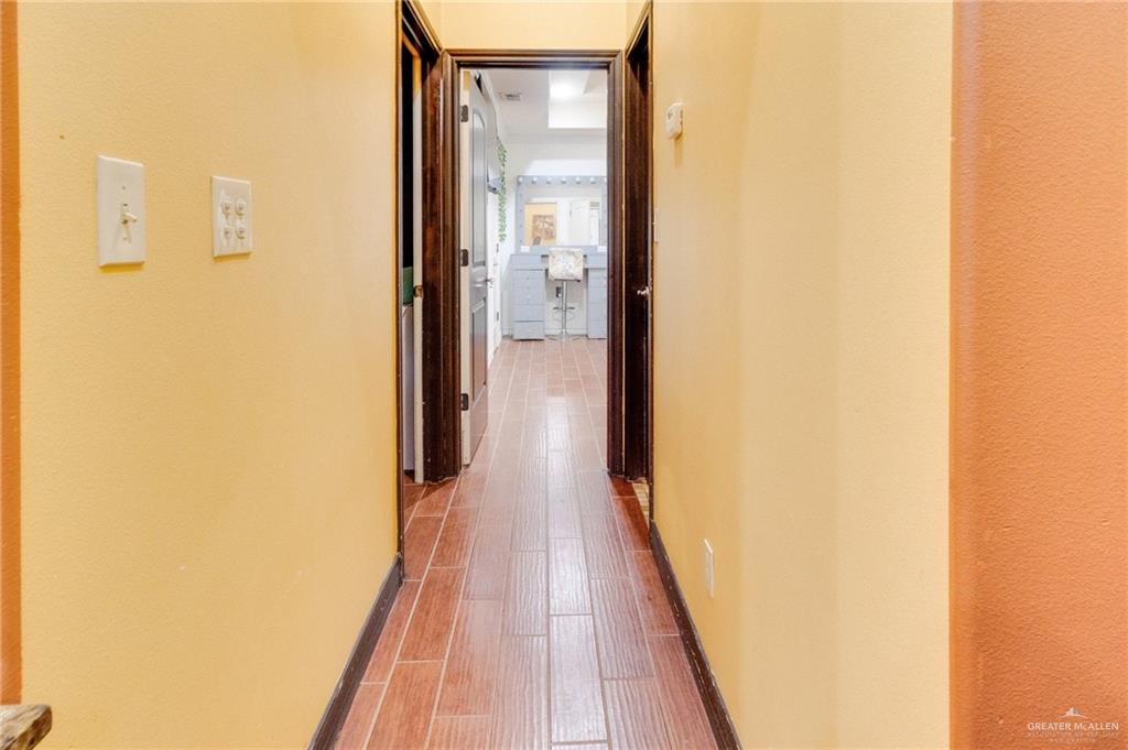 22811 Skinner Road Edcouch, TX 78538 - Photo 26 of 38 Wood-finish flooring throughout the hallway