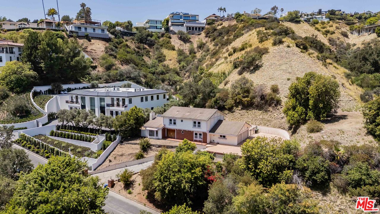 1181 Somera Road Los Angeles, CA 90077 - Photo 33 of 40 an aerial view of a house with a garden