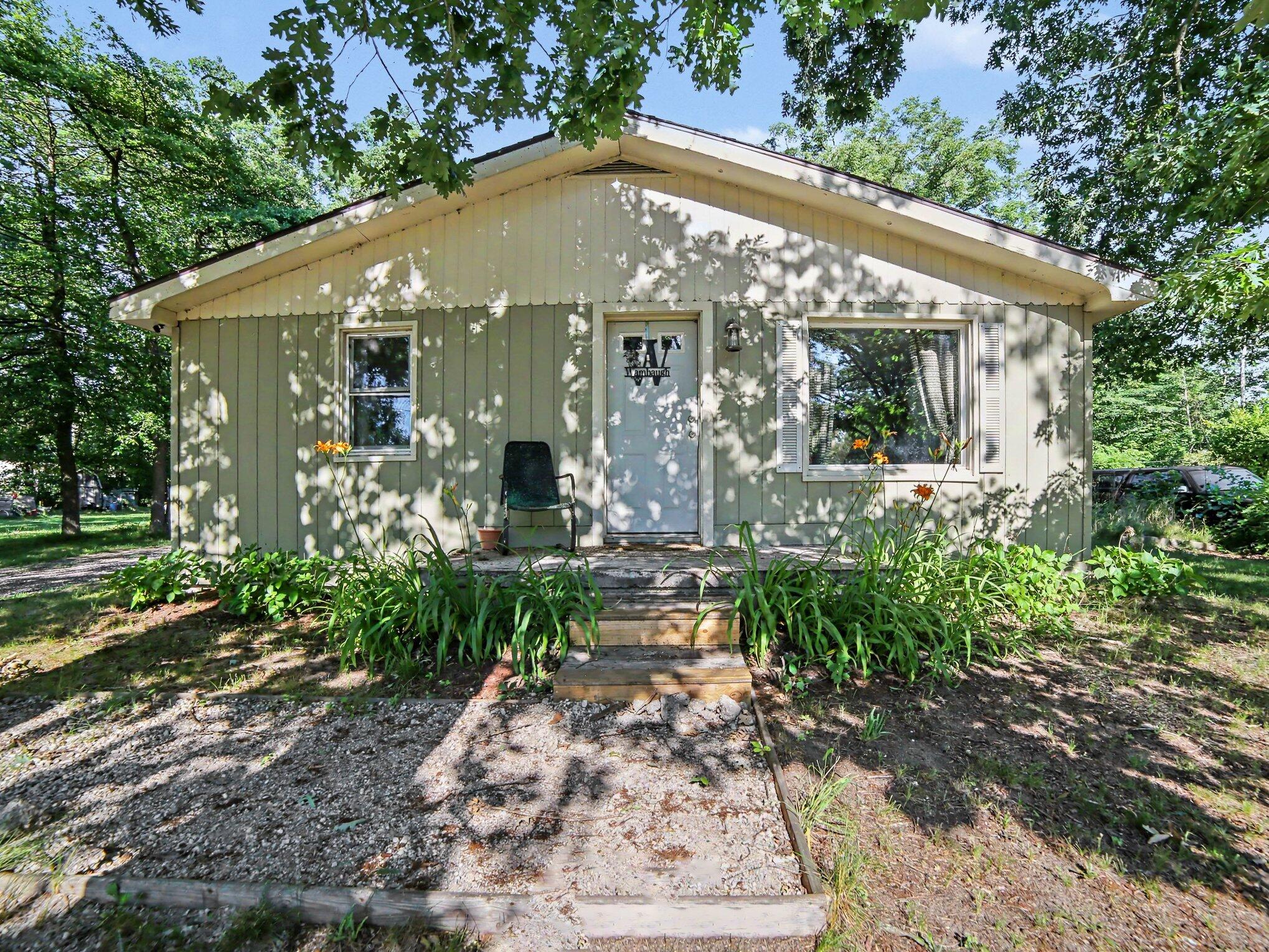 1460 South Mill Iron Road Muskegon, MI 49442 - Photo 2 of 26 Front of Home