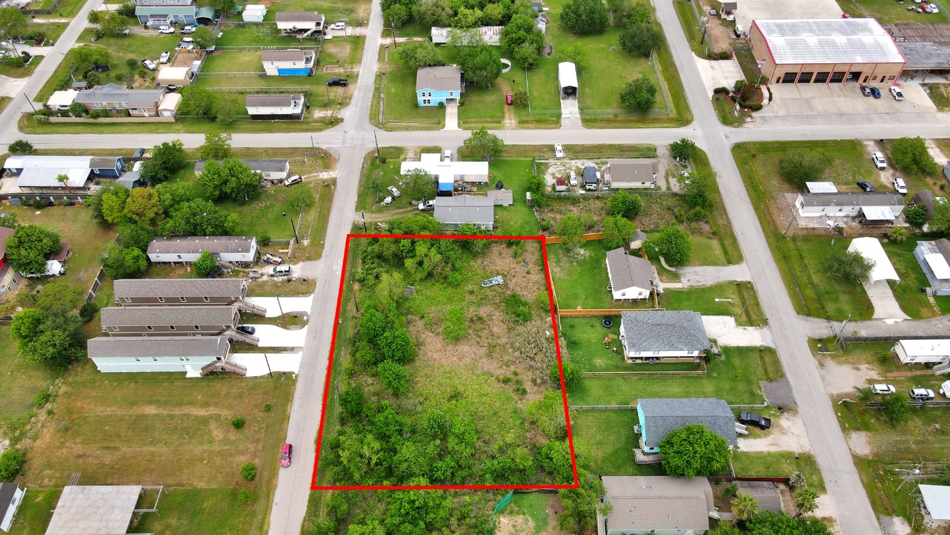 433 13th Street San Leon, TX 77539 - Photo 11 of 22 an aerial view of residential houses with outdoor space
