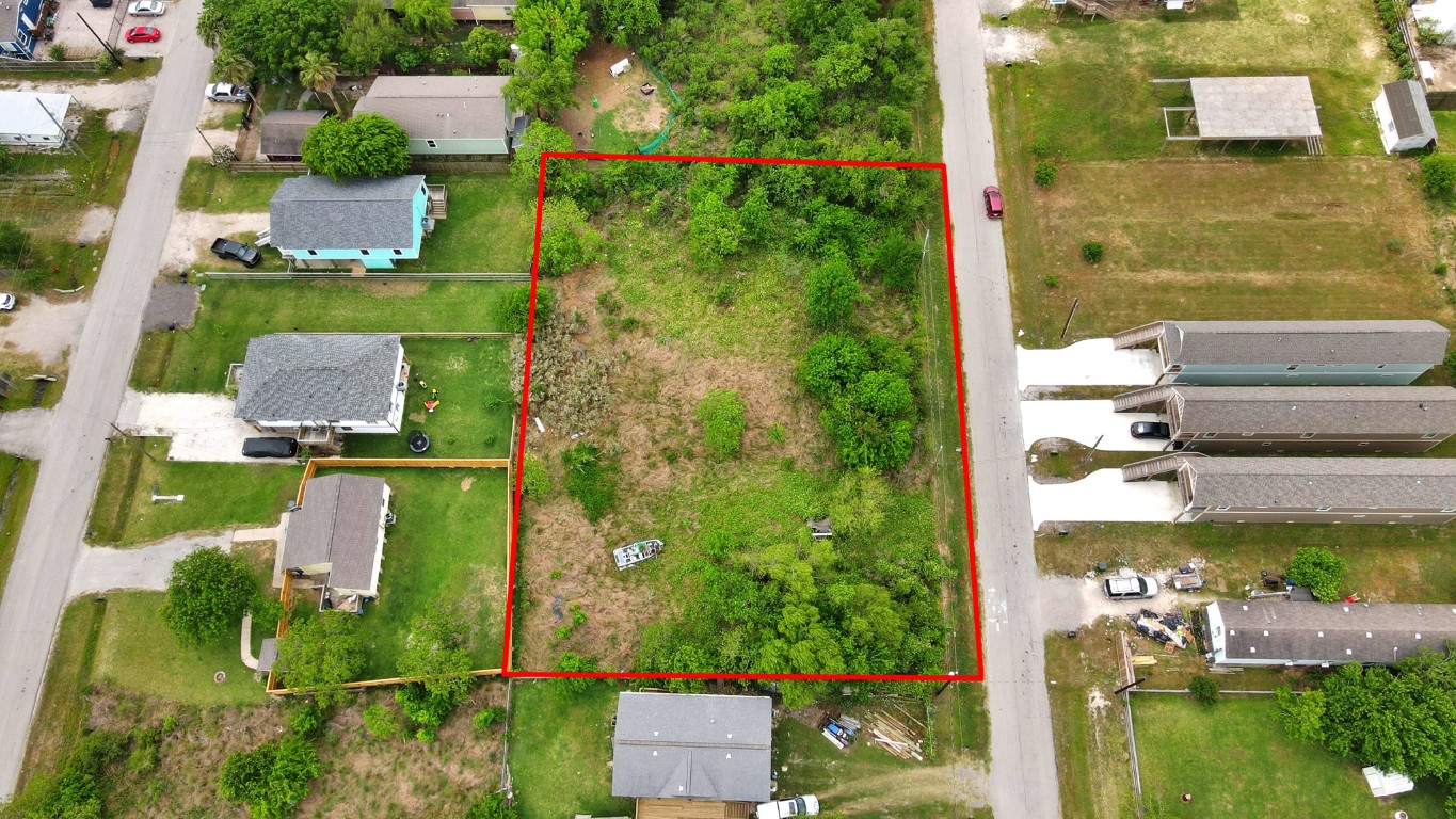 433 13th Street San Leon, TX 77539 - Photo 7 of 22 an aerial view of a house with a yard basket ball court and outdoor seating