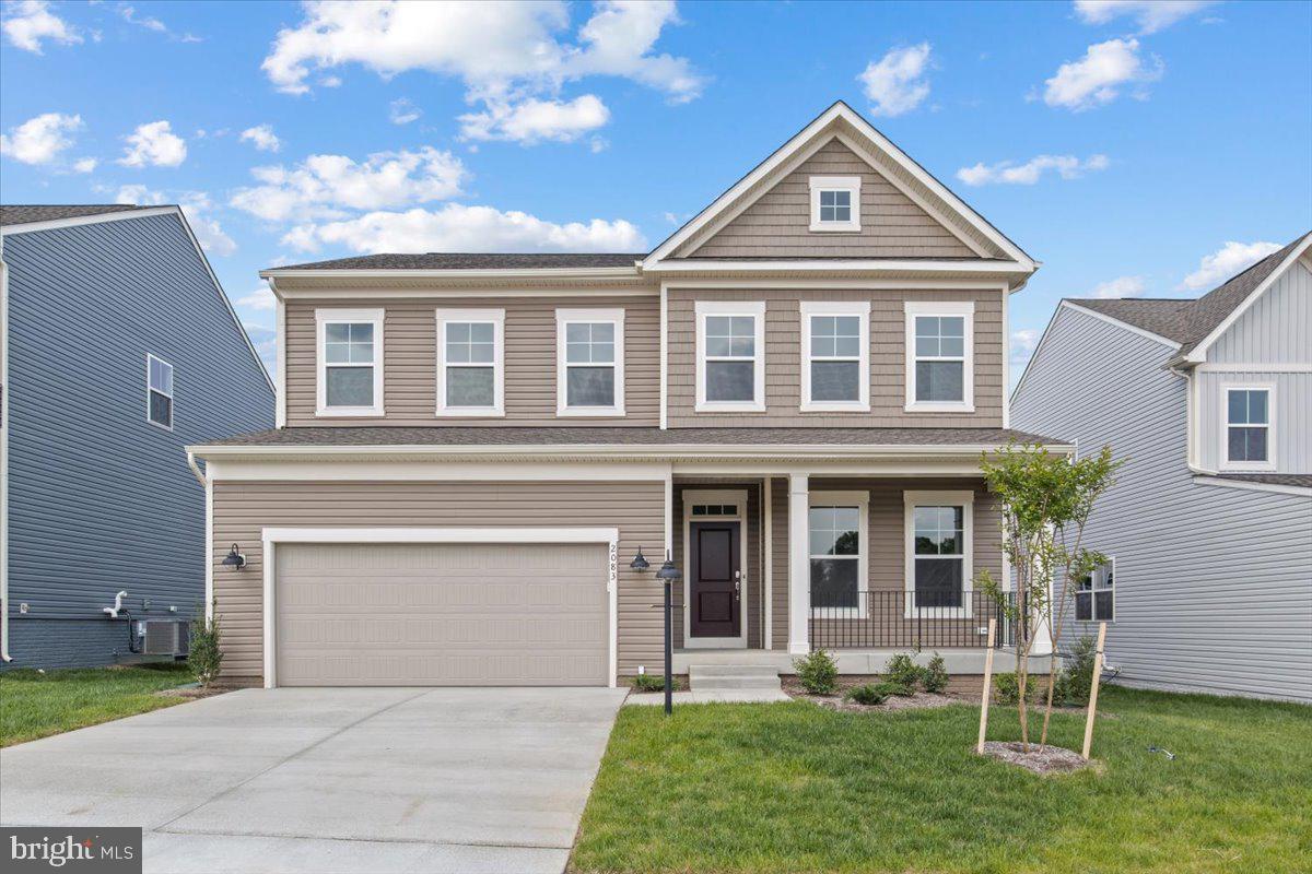 Stonehaven, Unit POWELL Warrenton, VA 20186 - Photo 1 of 25 a front view of a house with a yard