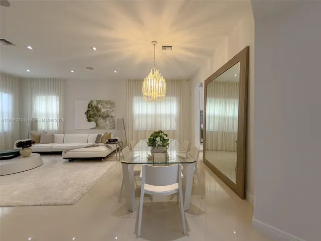 $1,310,000 | 9709 Blue Isle Bay, Parkland, FL 33076