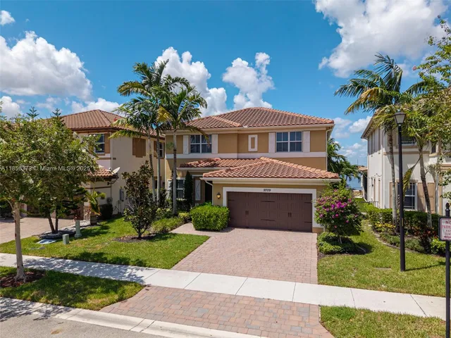 $1,310,000 | 9709 Blue Isle Bay, Parkland, FL 33076