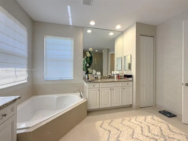 $1,310,000 | 9709 Blue Isle Bay, Parkland, FL 33076