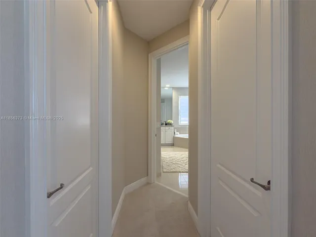 $1,310,000 | 9709 Blue Isle Bay, Parkland, FL 33076