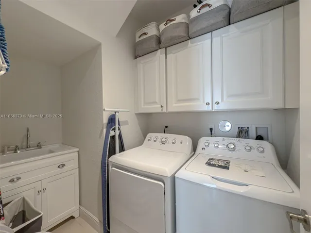 $1,310,000 | 9709 Blue Isle Bay, Parkland, FL 33076