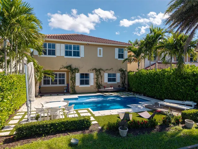 $1,310,000 | 9709 Blue Isle Bay, Parkland, FL 33076