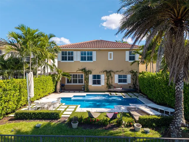 $1,310,000 | 9709 Blue Isle Bay, Parkland, FL 33076