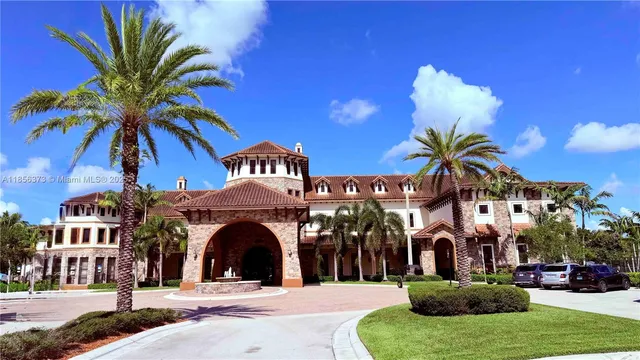 $1,310,000 | 9709 Blue Isle Bay, Parkland, FL 33076