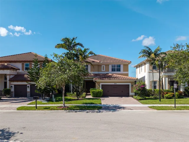 $1,310,000 | 9709 Blue Isle Bay, Parkland, FL 33076
