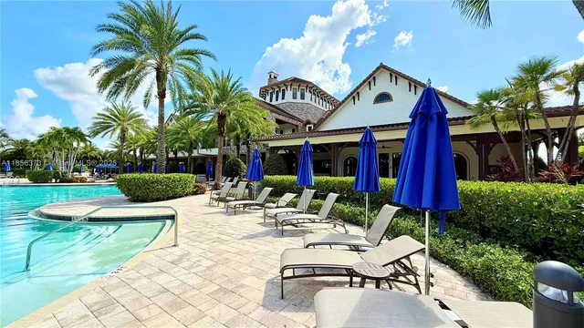 $1,310,000 | 9709 Blue Isle Bay, Parkland, FL 33076