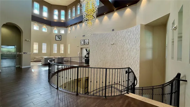 $1,310,000 | 9709 Blue Isle Bay, Parkland, FL 33076