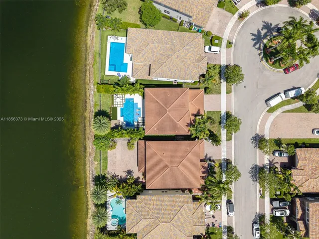 $1,310,000 | 9709 Blue Isle Bay, Parkland, FL 33076