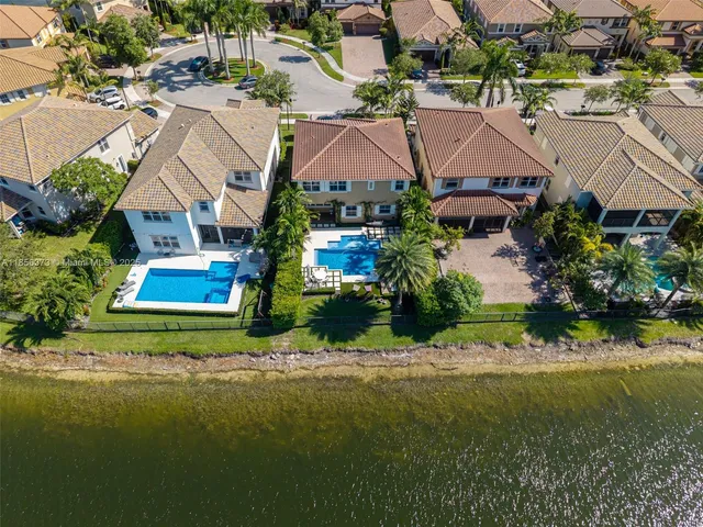 $1,310,000 | 9709 Blue Isle Bay, Parkland, FL 33076