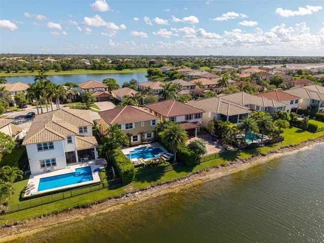 $1,310,000 | 9709 Blue Isle Bay, Parkland, FL 33076