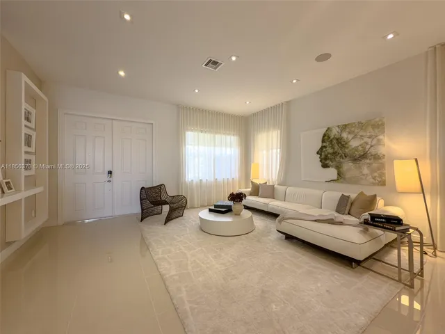 $1,310,000 | 9709 Blue Isle Bay, Parkland, FL 33076