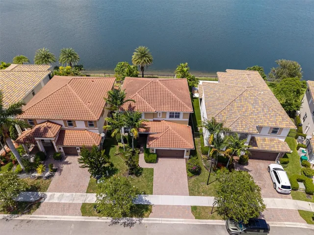 $1,310,000 | 9709 Blue Isle Bay, Parkland, FL 33076
