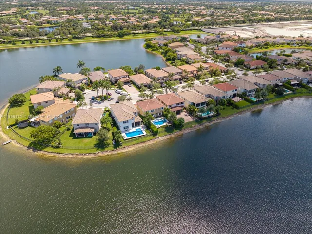 $1,310,000 | 9709 Blue Isle Bay, Parkland, FL 33076